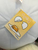 Golden Gudetama in Eggshell Medium Plush (In-stock)